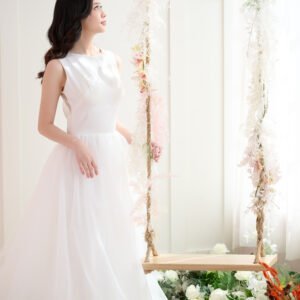 Rent Peony, the stunning A-line gown with a clean bateau neckline for your wedding day. The illusion lace back adorned with delicate white buttons adds extra sophistication to this beautiful gown."
